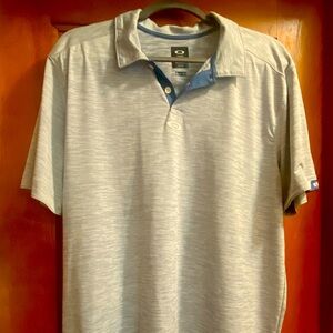 Oakley light blue golf shirt